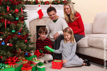 family near Christmas tree