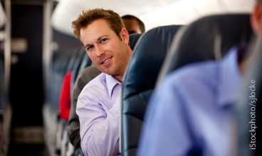 Man sitting on airplane