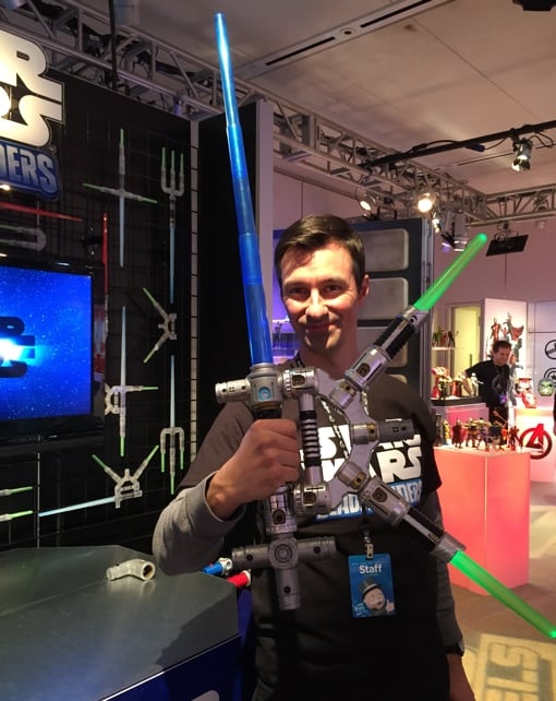 Man holding a Star Wars Bladebuilders Lightsaber