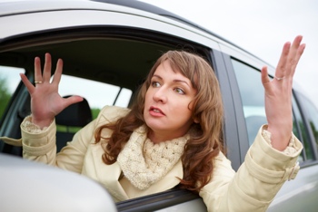 Woman stuck in traffic