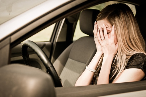 Woman upset in car