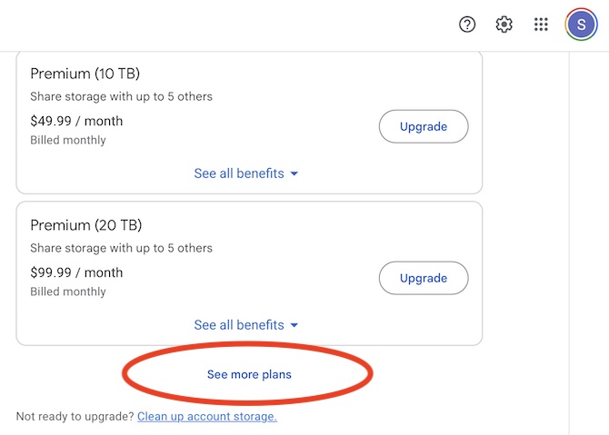 google one screen showing prominent upgrade options with tiny text that reads see more plans