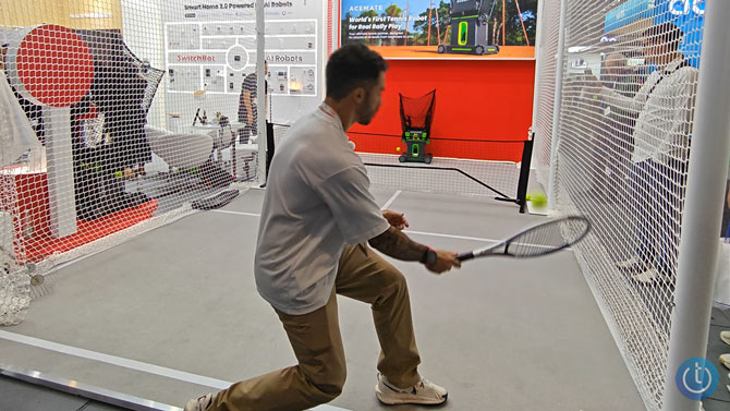 A person rallies with the Acemate Tennis Robot