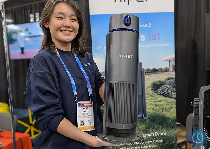 Aiper IrriSense 2 is held in a persons hands
