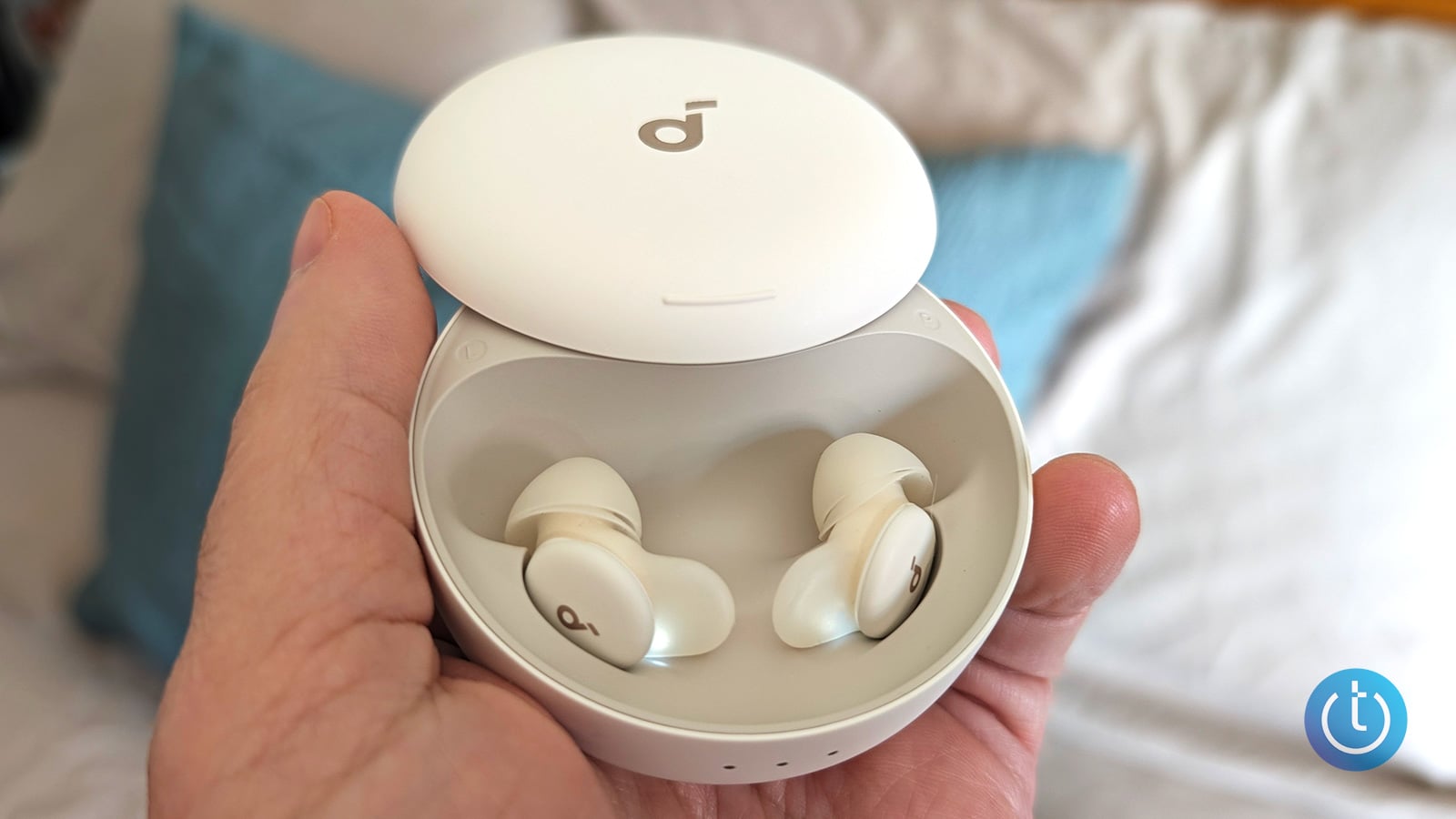 Anker's Soundcore A30 Sleep Buds in their case.