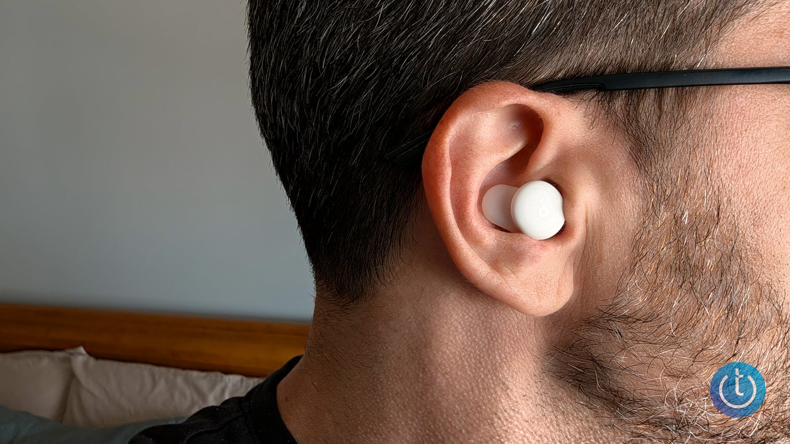 Anker's Soundcore A30 Sleep Buds in the writer's ear.