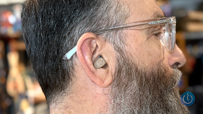 The Audien Atom X is shown in ear from the side