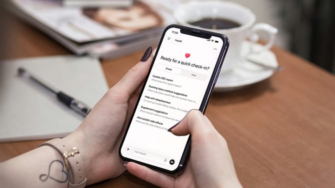 A phone shows the screen for ChatGPT Health's health check-in.
