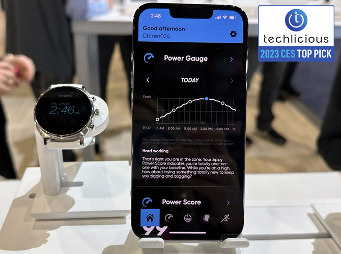 Citizen CZ Smart Watch (41mm) on the left with smartphone showing the power gauge screen.