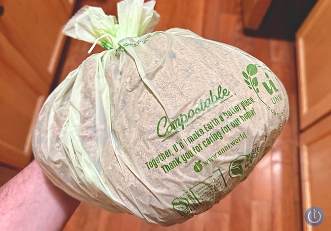 Compostable bag filled with compost