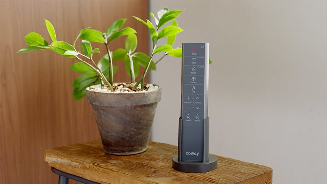 Close up shot of the Coway Bidetmega 500 S remote control.