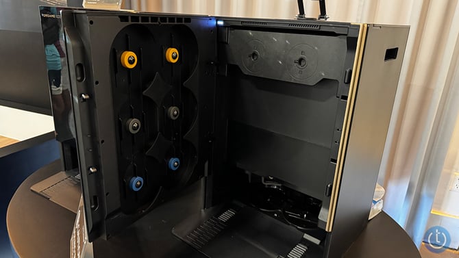 Dreame Matrix10 Ultra is shown with the front open and three sets of mop-pad mounts visible.