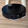 Dreame's new robot vac sprouts arms to clean around chair legs