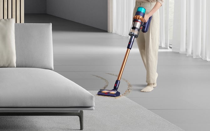 Dyson Gen5detect shown vacuuming without the laser on.