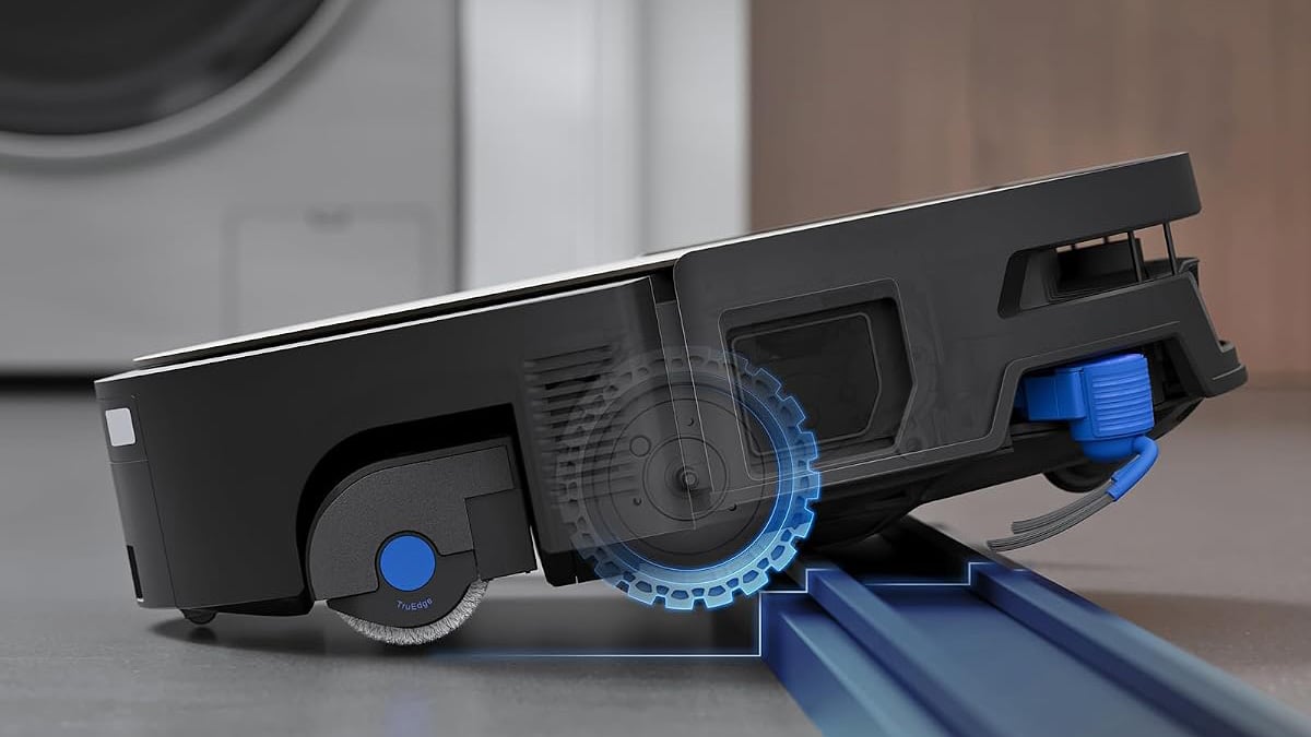 Side view of an Ecovacs Deebot X12S Pro Omni climbing a raised threshold, with its wheel mechanism highlighted.