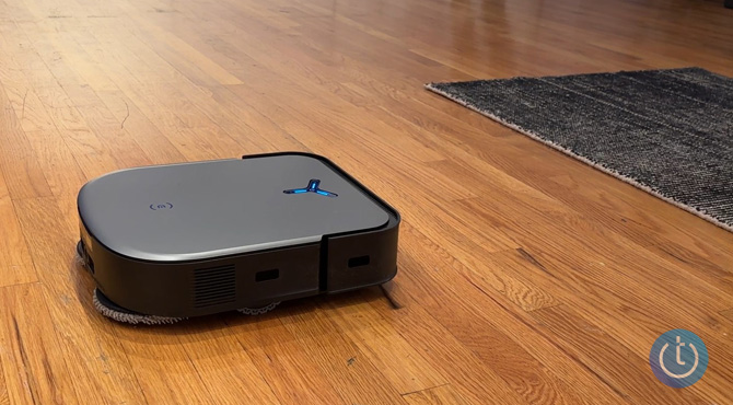 Ecovacs Deebot X2 Omni on a wood floor.