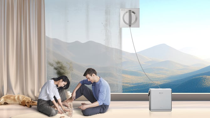Ecovacs W2 Pro shown cleaning a window using battery power
