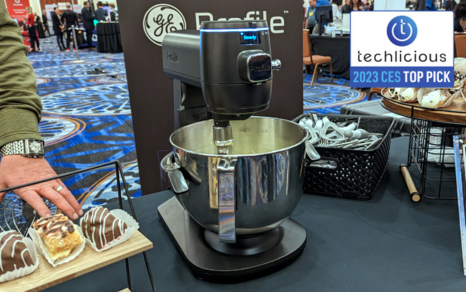GE Profile Smart Mixer shown on a table with cannolis.