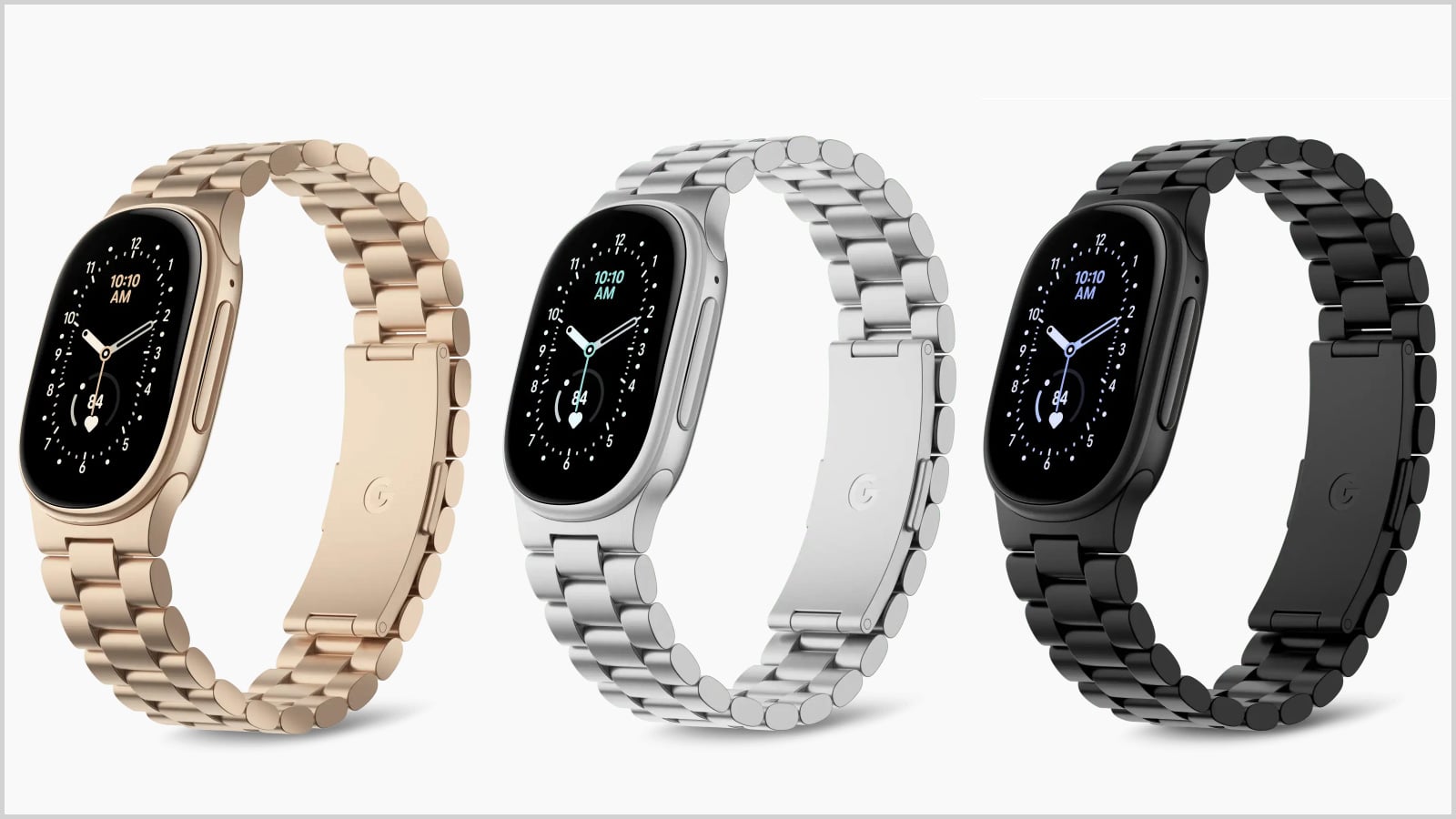 Three Google Fitbit Edge trackers with matching gold, silver, and black metal link bands, displaying the time and heart rate.