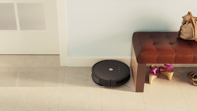 iRobot Roomba Combo Essential is shown in an entry hallway.
