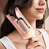 This $85 curling iron might have saved my teenage bangs