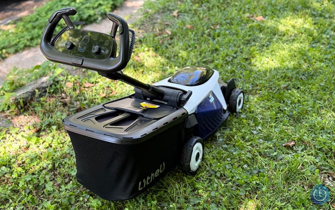 Litheli EASYSURGE 18.5-inch lawn mower is shown from the back three-quarter angle view.