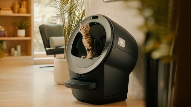 Cat sitting in Whisker LR5 Pro