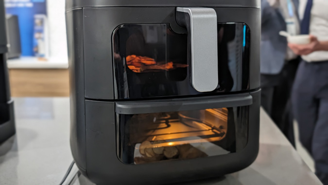 Midea 10-in-1 Two-Zone Air Fryer Oven showing dual windows in the front