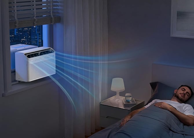 Midea U-Shaped Smart Inverter Window Air Conditioner is shown installed in a window.