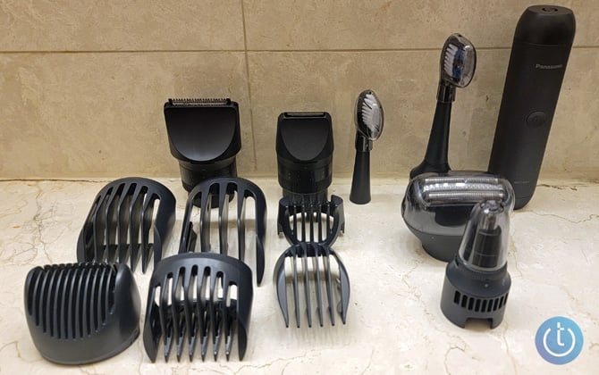 Panasonic Multishape Li-ion base, 3-blade shaver head, nose trimmer, and toothbrush with two brush heads on bathroom counter.