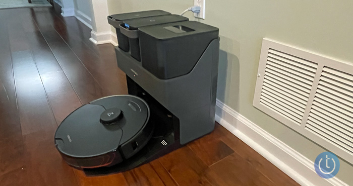 Roborock MaxV Ultra in its dock with the back lifted for drying.