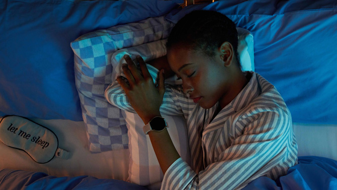 Woman sleeping wearing Galaxy Watch6