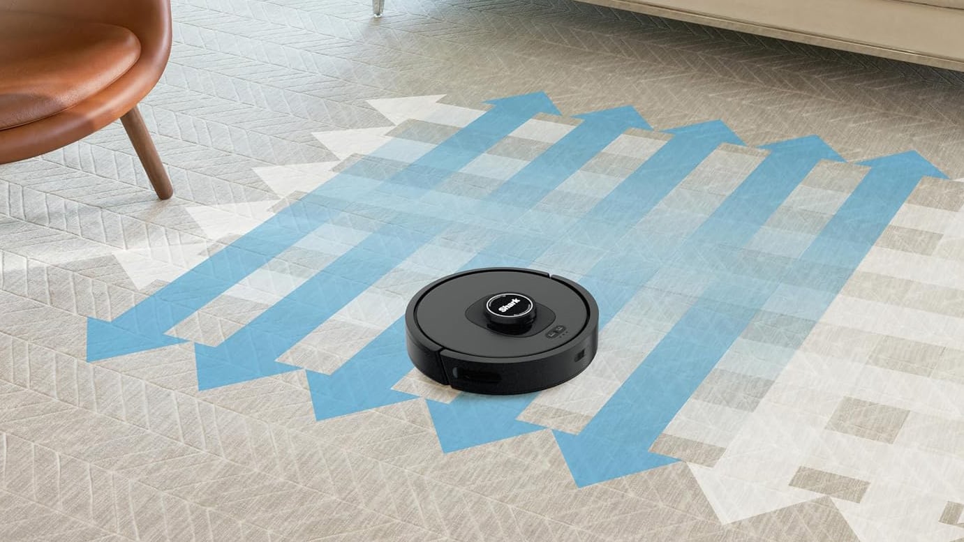 Shark AI Ultra robot vacuum on a rug, with blue arrows illustrating its back-and-forth cleaning pattern.
