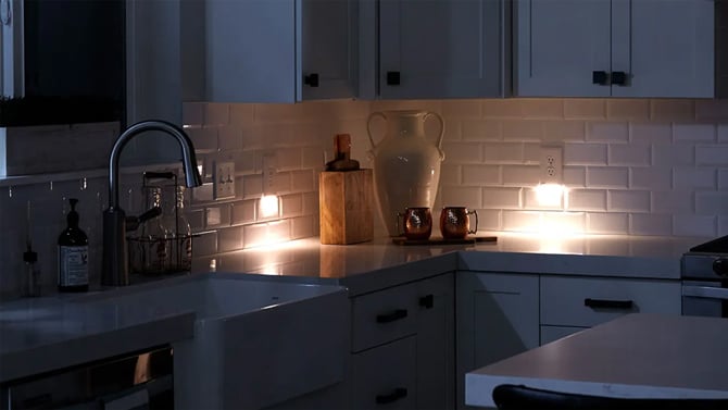 SnapPower GuideLight shown installed in kitchen at night.