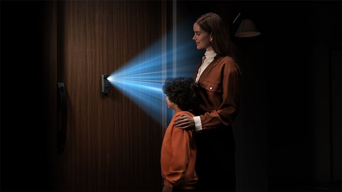 Concept image showing how the SwitchBot Lock Ultra Vision can scan your face to unlock the door.