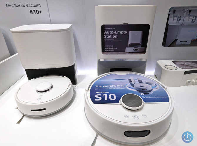 SwitchBot Mini K10+ on the left with the S10 robot vacuum on the right for scale