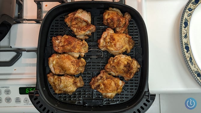 Typhur Dome Air Fryer with eight cooked chicken thighs
