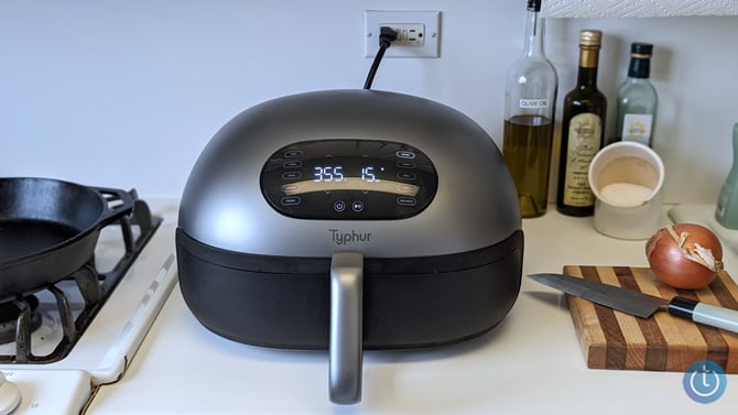 Typhur Dome Air Fryer shown a counter next to a stove