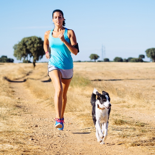 Woman exercising with her dog