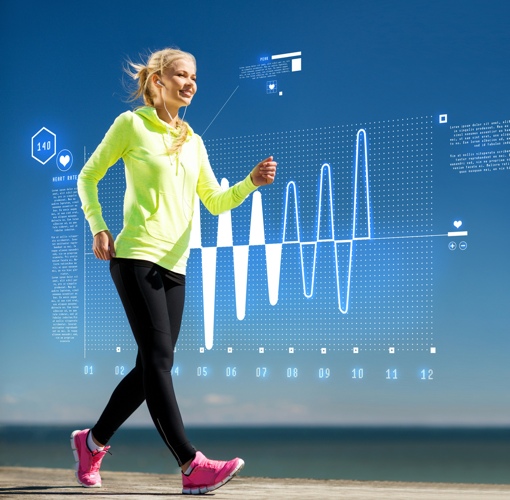 Woman walking with a fitness tracker