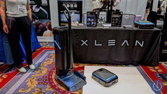 the XLean TR1 base with handle and mopvac shown cleaning.