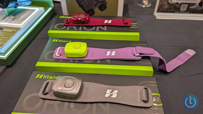 Xtand Orion Intelligent Patella Strap (Pro) shown in a variety of colors: from the top are red, pink, and brown