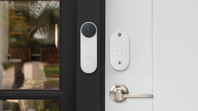 Yale Smart Lock with Matter mounted on a door with a Nest Doorbell to the left.