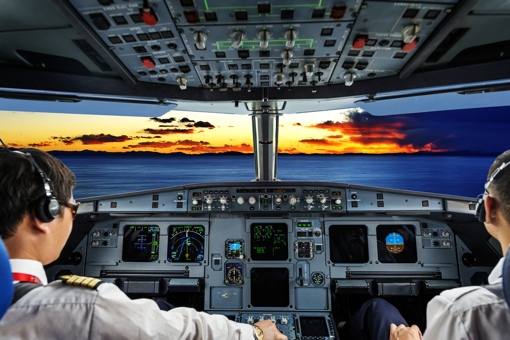 Pilots in an airplane cockpit