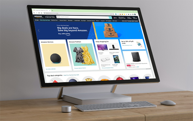  The computer screen has a screenshot of Amazon website showing Amazon Prime Day. 