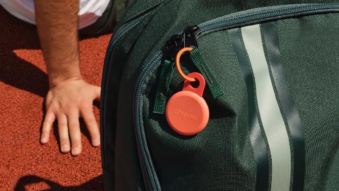 Chipolo Loop attached to a backpack zipper