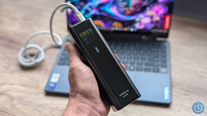 The Cuktech 15 Ultra is shown powering a Lenovo Laptop.