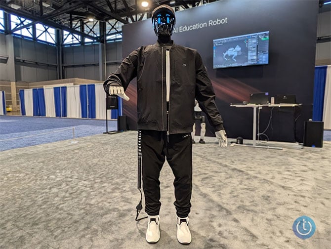 Faraday All-New Futurist shown dressed in human clothes standing on show floor
