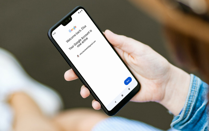 Android phone showing a screen that says Welcome back, Elisa, your Google Account is now active. 