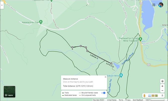 Google Maps screenshot showing 5 dots along a trail that show the total distance, plus a box entitle measure distance with a Total distance measurement. 